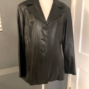 Woman’s black leather blazer